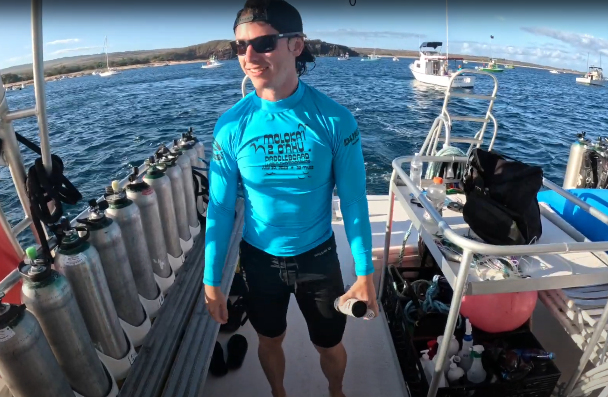 My son Matthew aboard our Dive Oahu chase boat, 'Stress Relief'
